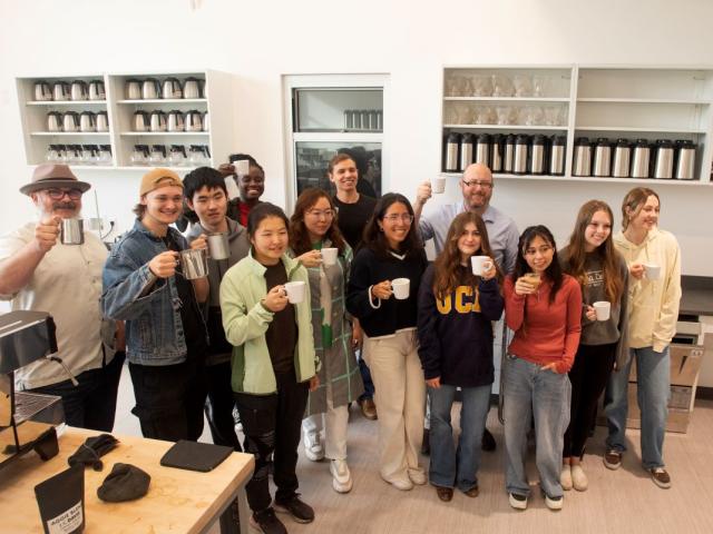 Professor William Ristenpart and head roster Tim Styczynski gather the class for a photo during the coffee class at the Coffee Center