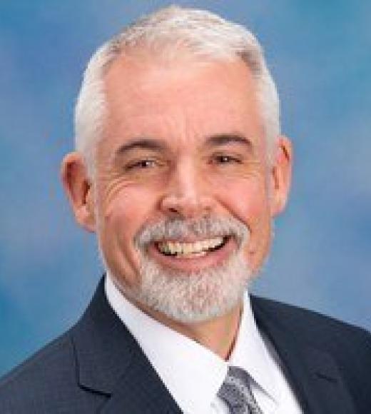 portrait of Tom Tomich