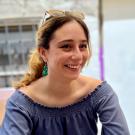 A portrait of Kat Di lulio smiling